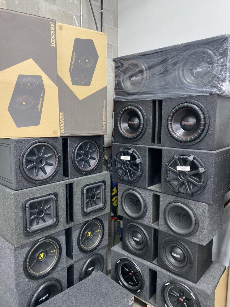 Stacked Kicker and American Bass subwoofer boxes